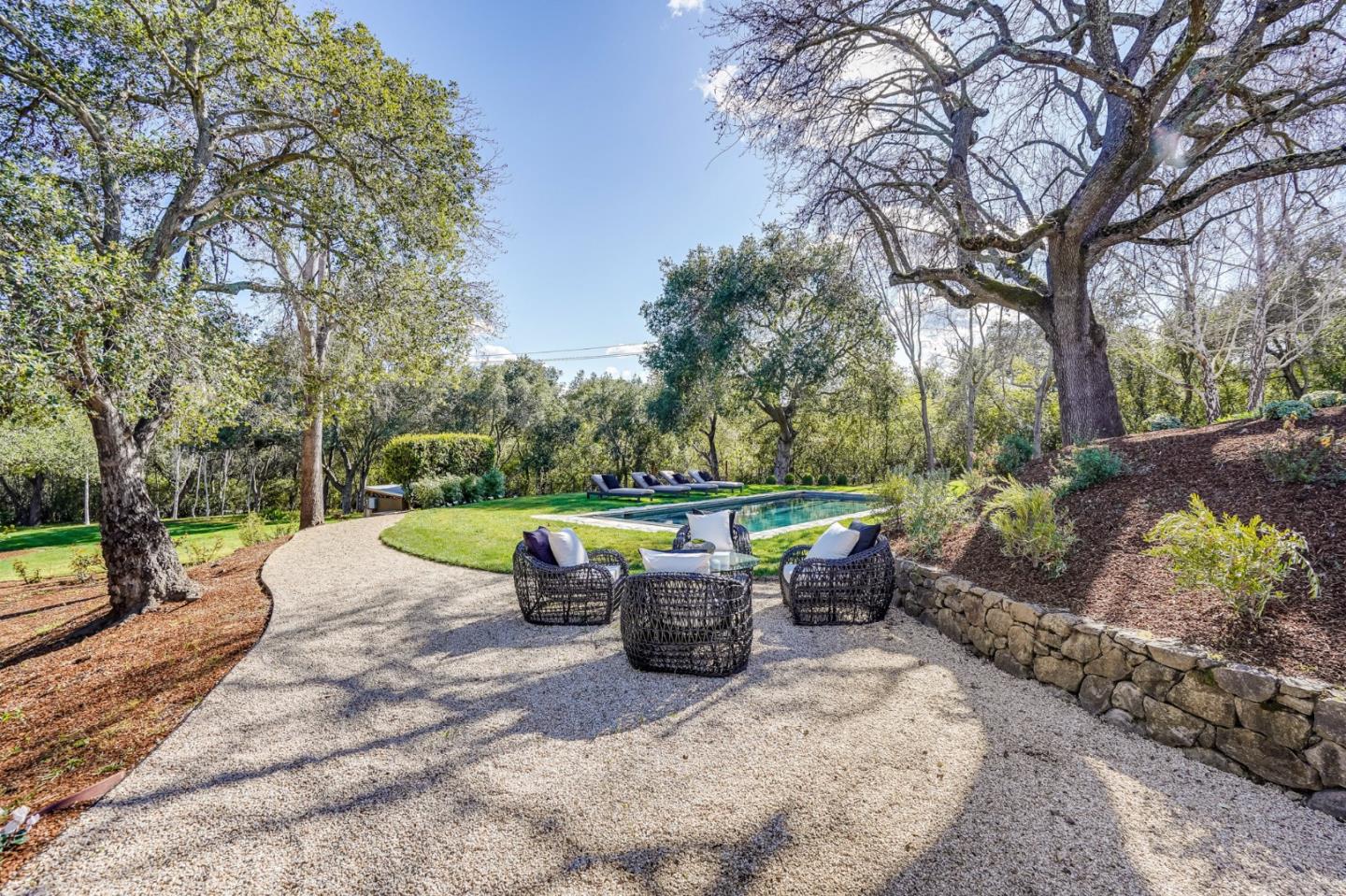 540 Moore Road Woodside, CA 94062 - Photo 19 of 85 a view of a backyard with sitting area