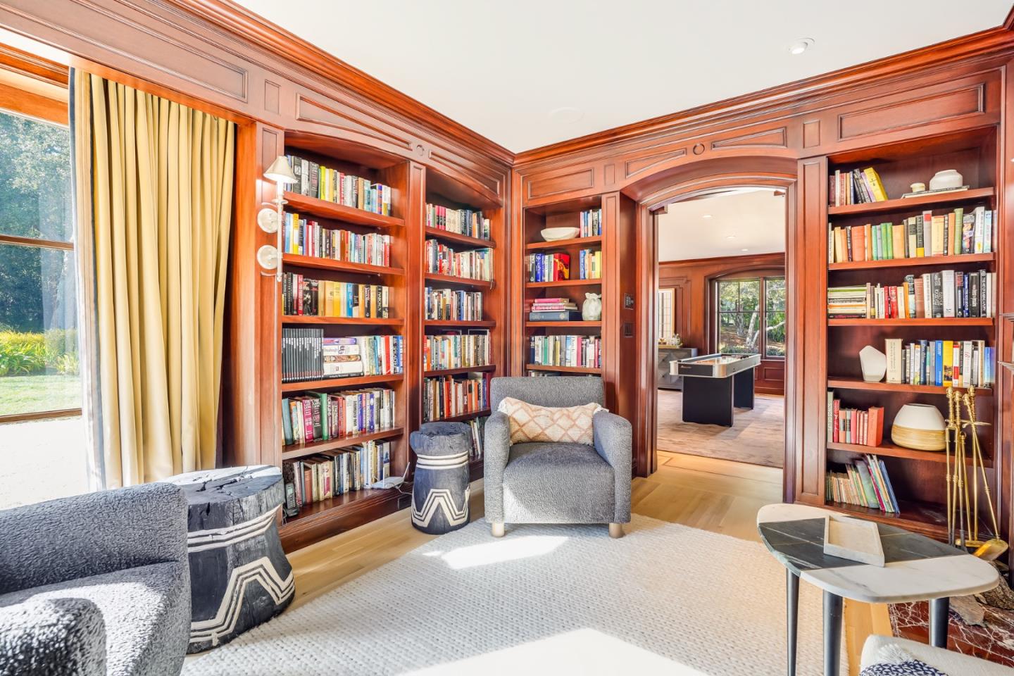 540 Moore Road Woodside, CA 94062 - Photo 32 of 85 a reading room with furniture and a book shelf