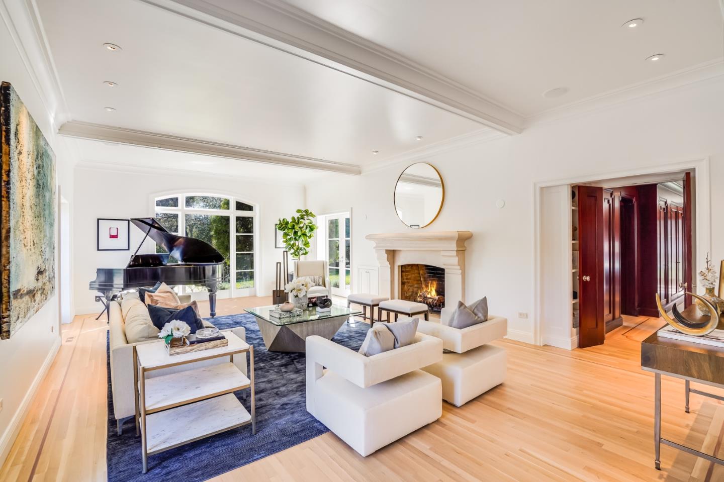 540 Moore Road Woodside, CA 94062 - Photo 33 of 85 a living room with furniture a fireplace and a potted plant