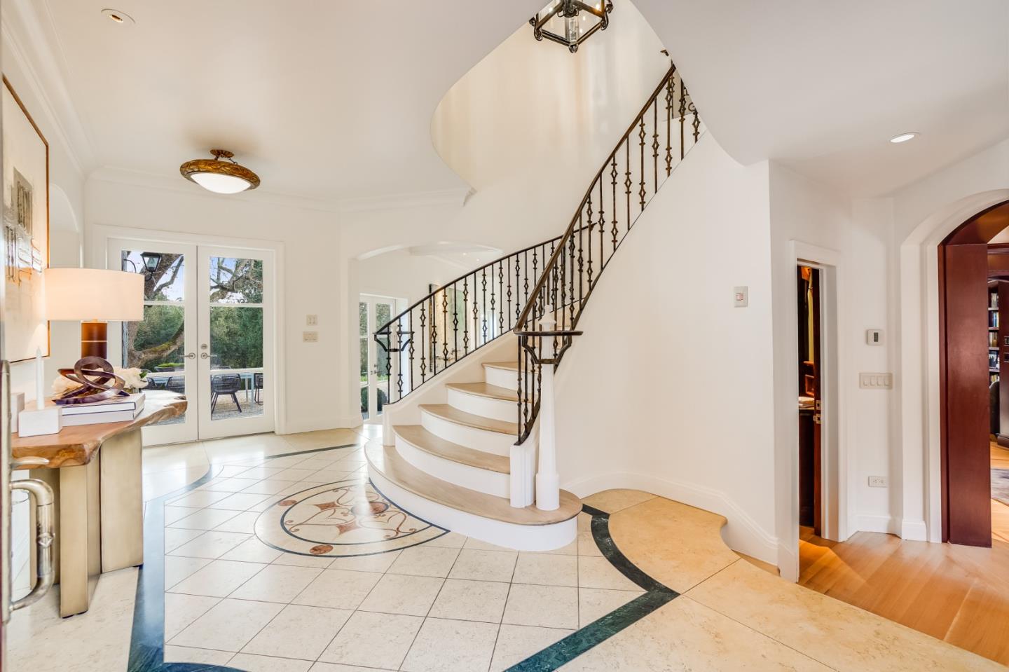 540 Moore Road Woodside, CA 94062 - Photo 36 of 85 a view of entryway dining room and hall with wooden floor