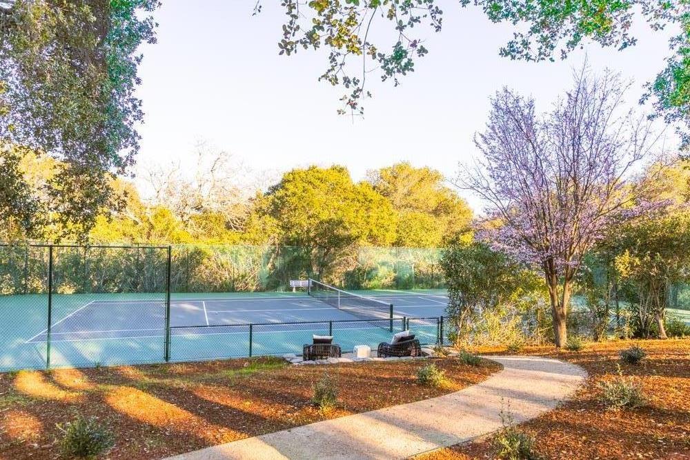 540 Moore Road Woodside, CA 94062 - Photo 4 of 85 a backyard of a house with lots of green space