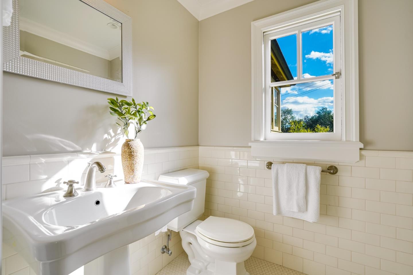 540 Moore Road Woodside, CA 94062 - Photo 45 of 85 a bathroom with a sink mirror and toilet