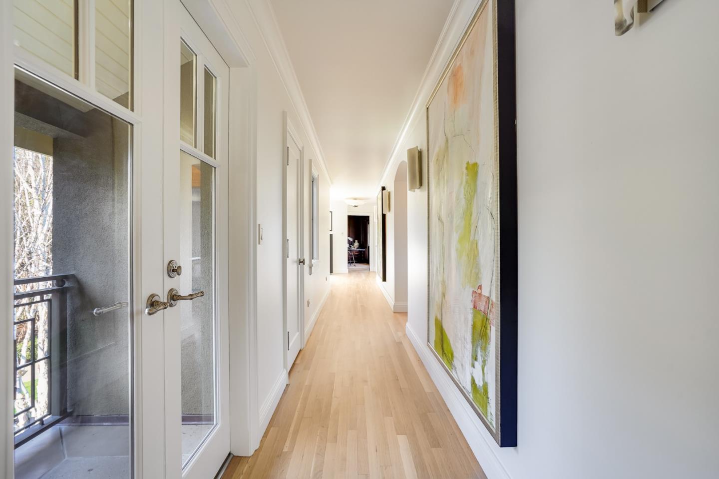540 Moore Road Woodside, CA 94062 - Photo 55 of 85 a view of a hallway with wooden floor and staircase