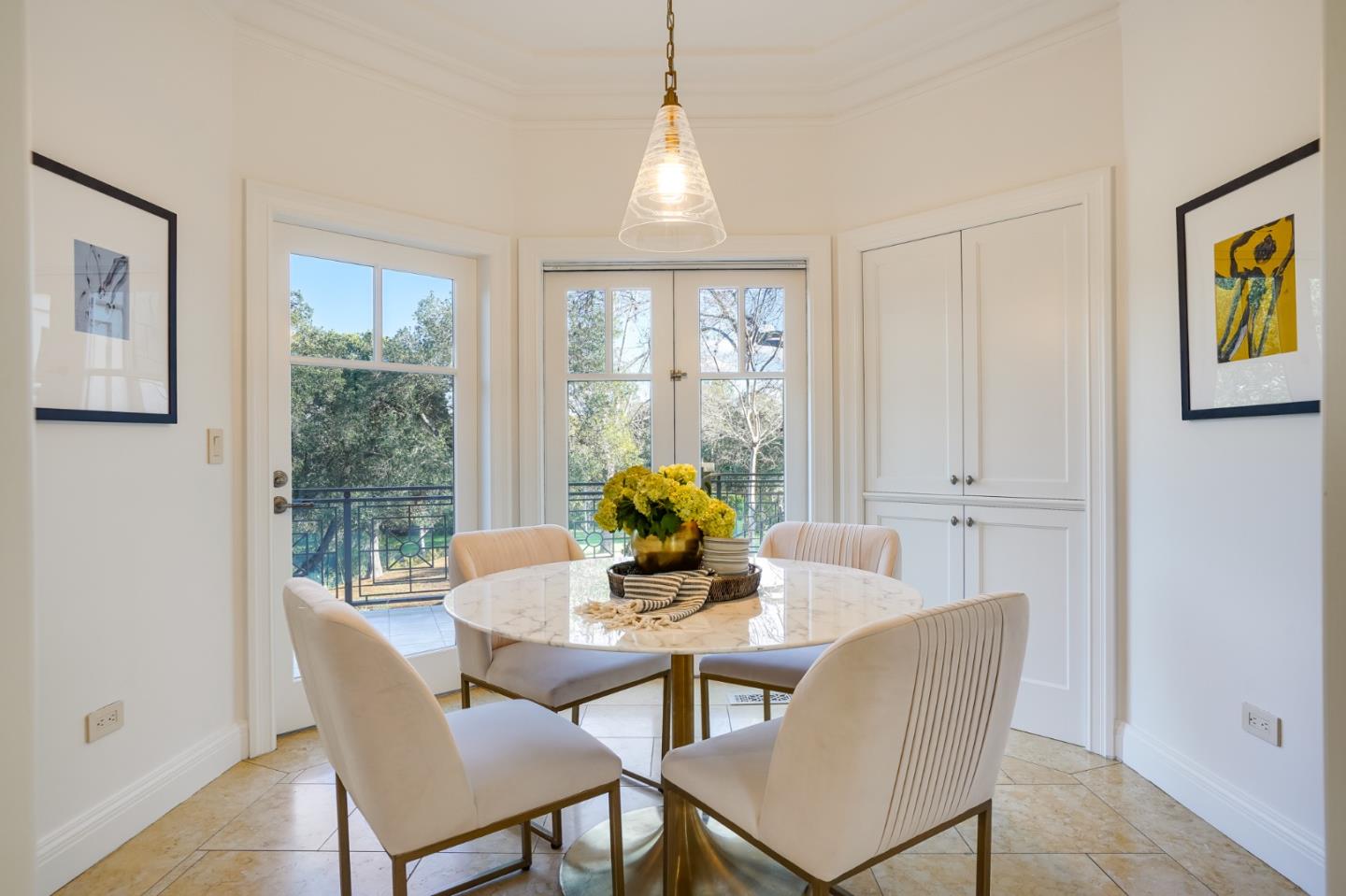 540 Moore Road Woodside, CA 94062 - Photo 61 of 85 a dining room with furniture a chandelier and wooden floor