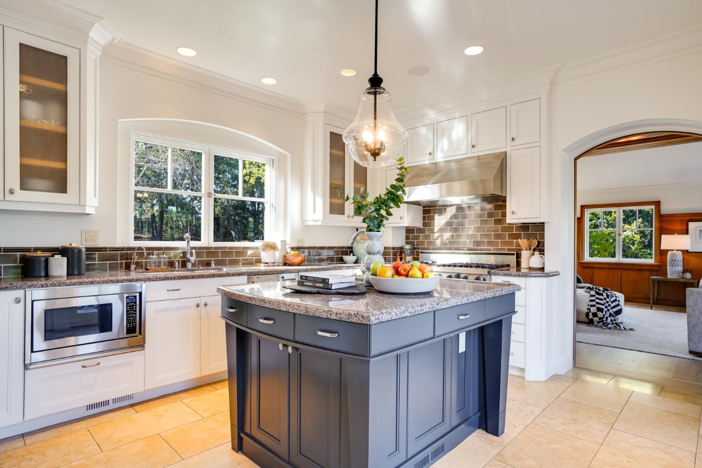 540 Moore Road Woodside, CA 94062 - Photo 63 of 85 a kitchen with a sink stove and cabinets
