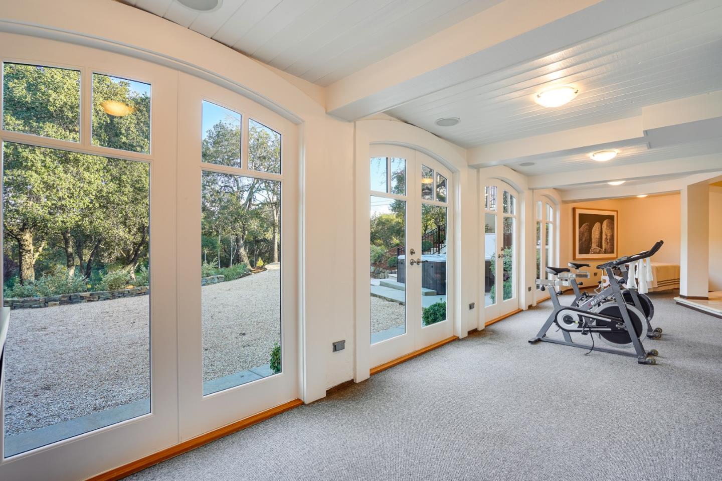 540 Moore Road Woodside, CA 94062 - Photo 73 of 85 a view of a room with gym equipment