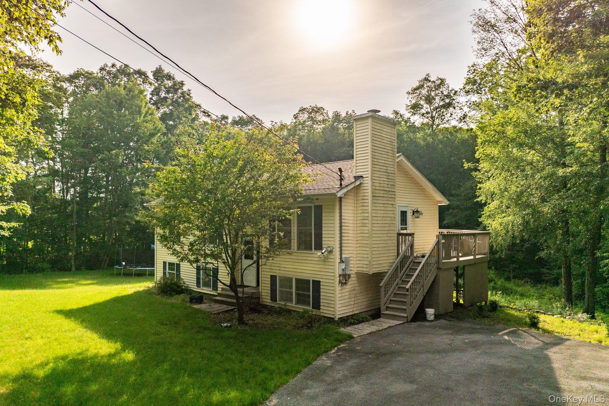 151 Schoolhouse Road Middletown, NY 10940 - Photo 1 of 1 a view of a house with a yard balcony and sitting area