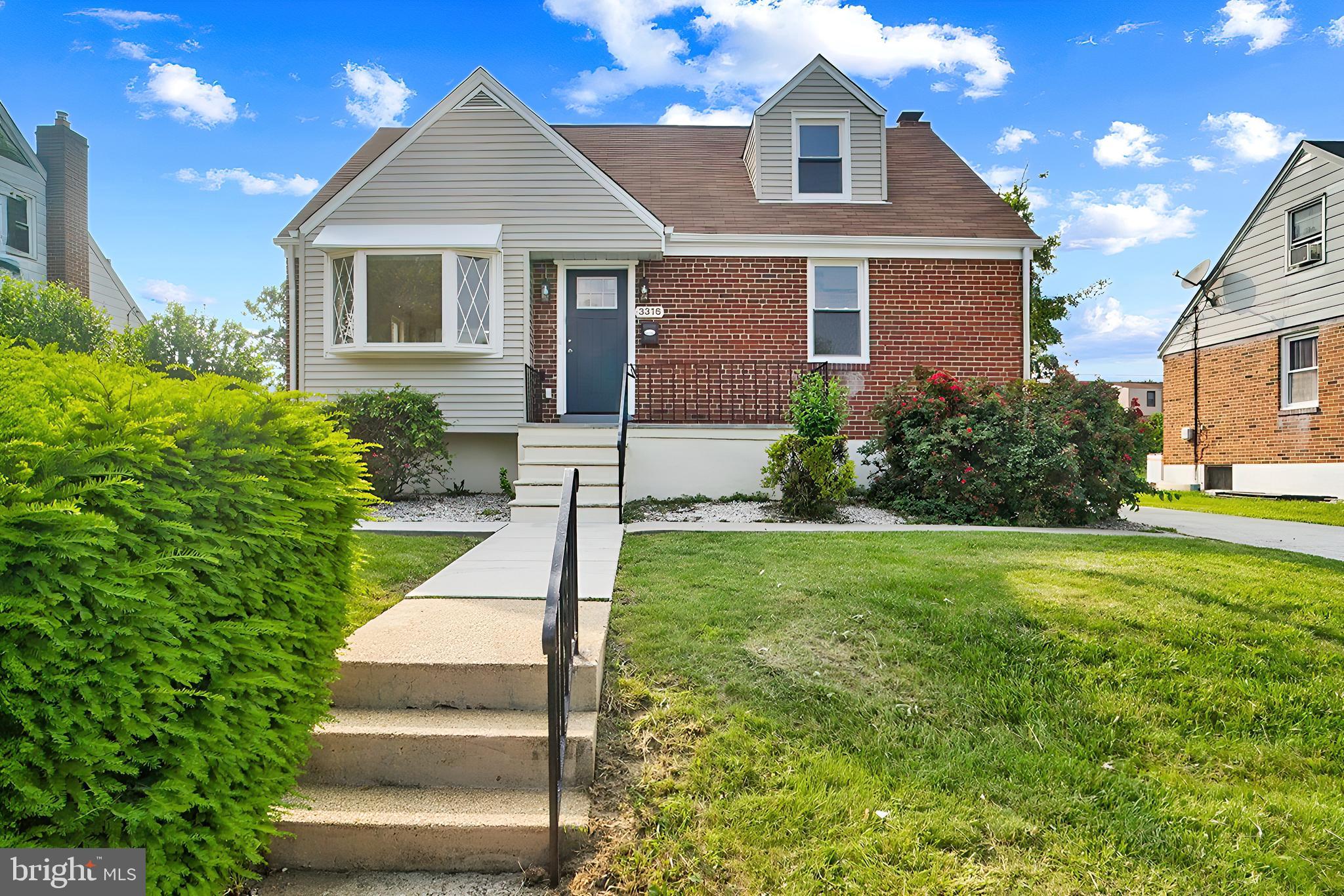 3316 Fairview Road Baltimore, MD 21207 - Photo 1 of 41 a front view of a house with garden