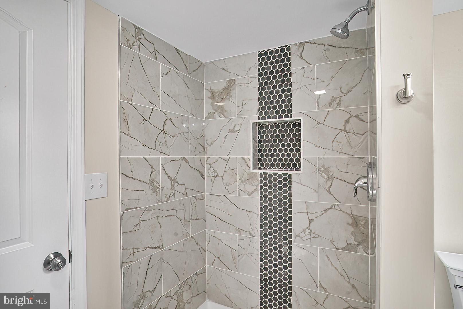 3316 Fairview Road Baltimore, MD 21207 - Photo 15 of 41 a bathroom with a shower