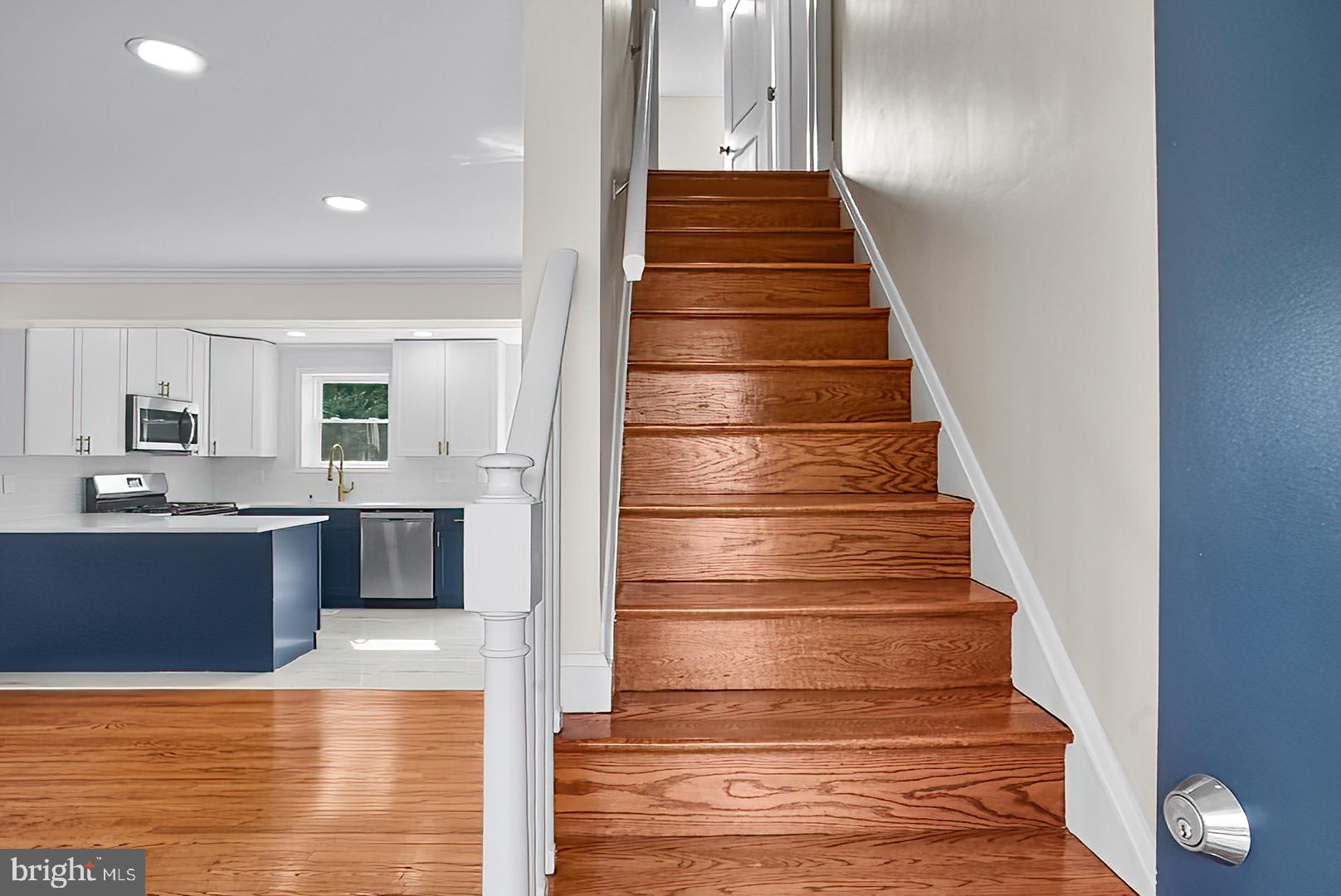 3316 Fairview Road Baltimore, MD 21207 - Photo 19 of 41 a view of entryway and hall with wooden floor