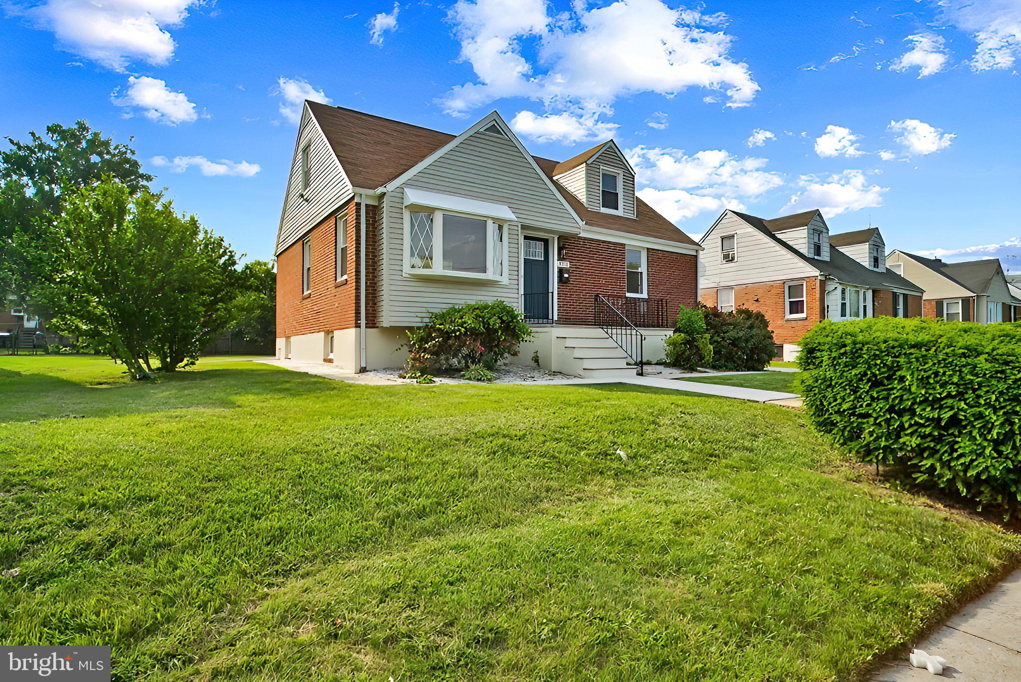 3316 Fairview Road Baltimore, MD 21207 - Photo 2 of 41 a front view of a house with garden