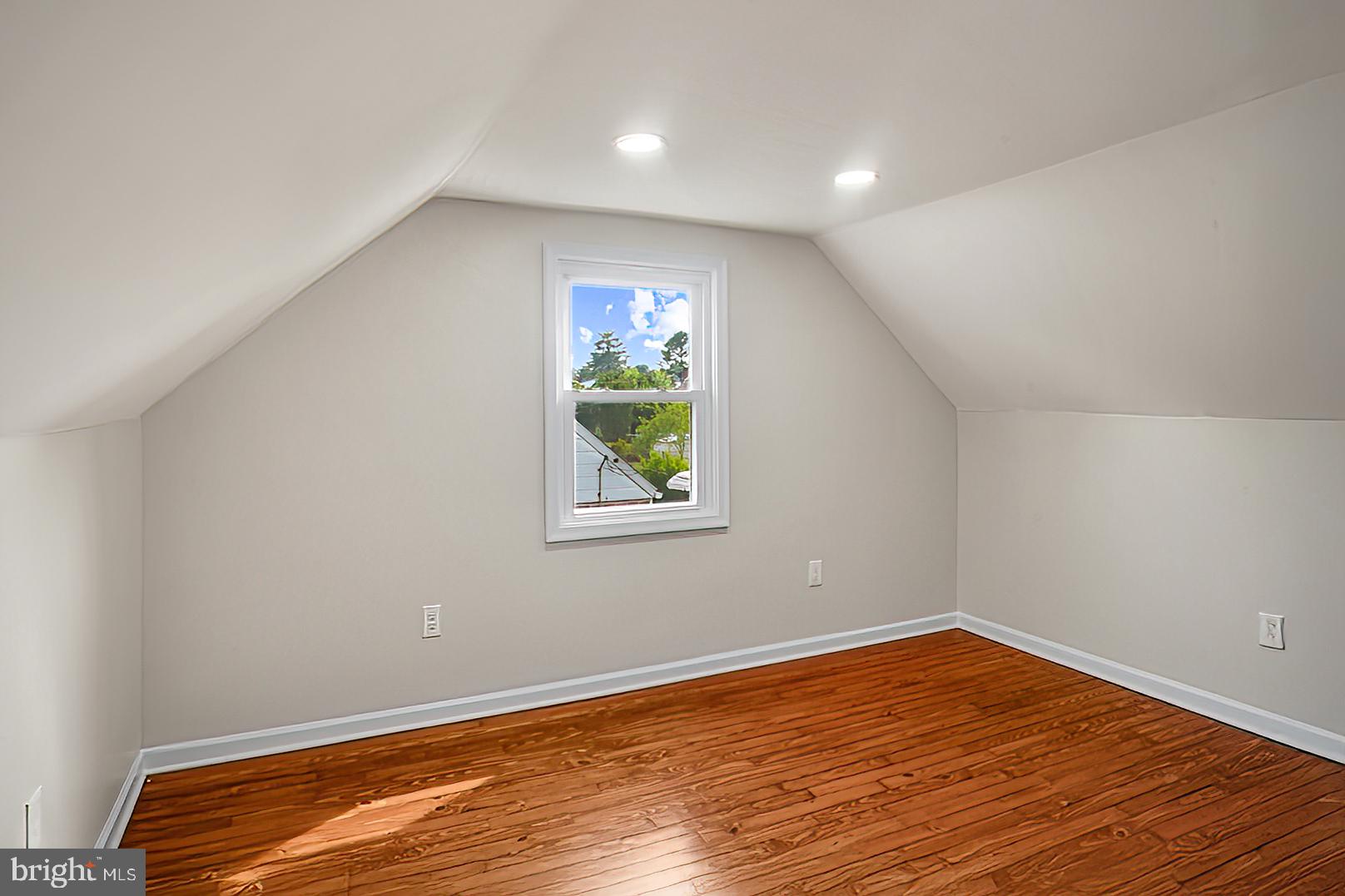 3316 Fairview Road Baltimore, MD 21207 - Photo 23 of 41 a view of empty room with wooden floor and fan