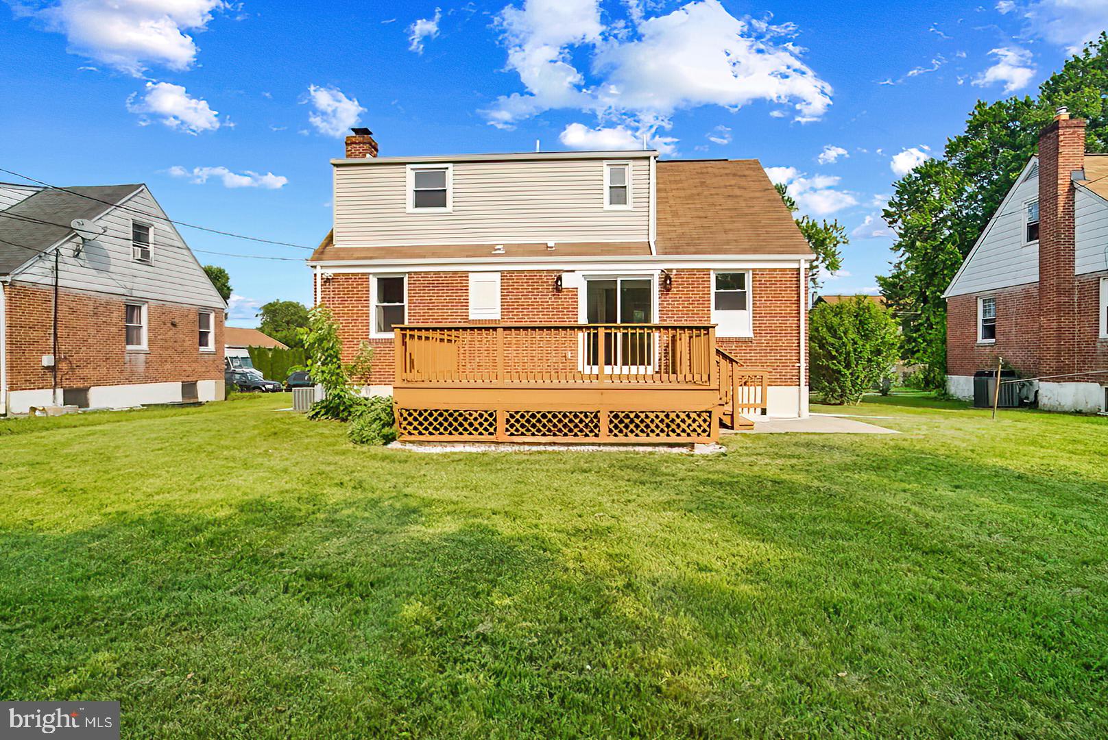 3316 Fairview Road Baltimore, MD 21207 - Photo 33 of 41 a front view of a house with a yard