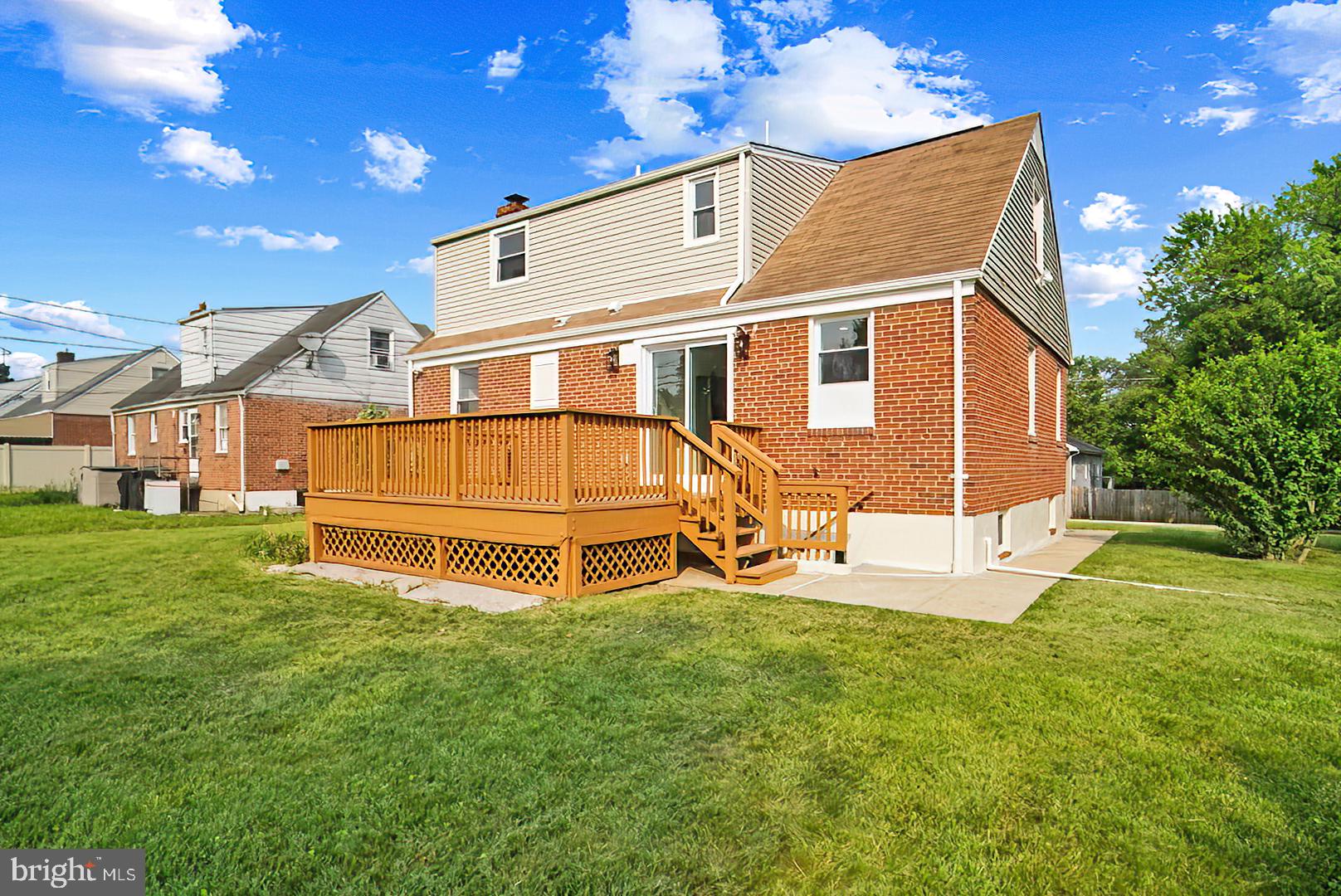 3316 Fairview Road Baltimore, MD 21207 - Photo 34 of 41 a view of a house with a backyard