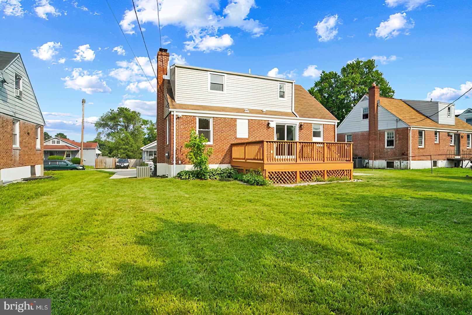 3316 Fairview Road Baltimore, MD 21207 - Photo 35 of 41 a front view of a house with a yard
