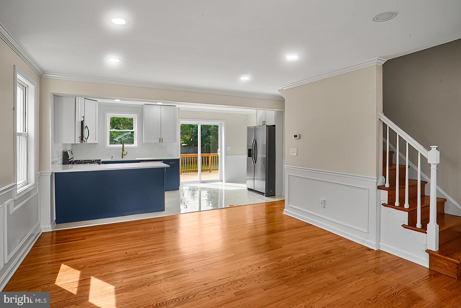 3316 Fairview Road Baltimore, MD 21207 - Photo 6 of 41 a view of a kitchen center island and wooden floor