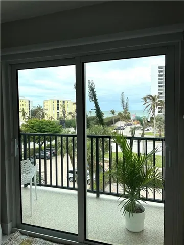 a view of a city from a room