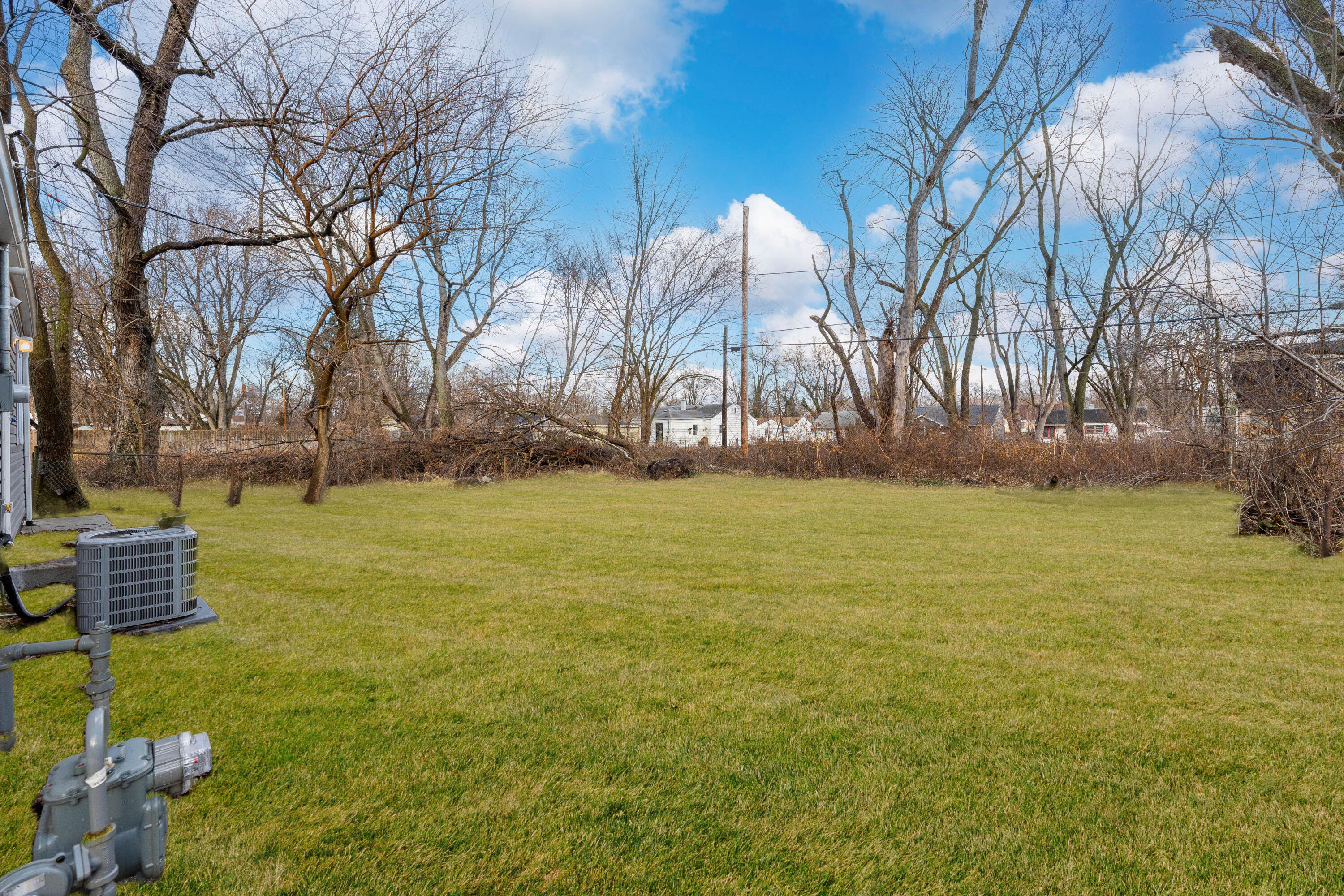 1151 Benton Street Gary, IN 46403 - Photo 21 of 23 a view of outdoor space with deck and tree