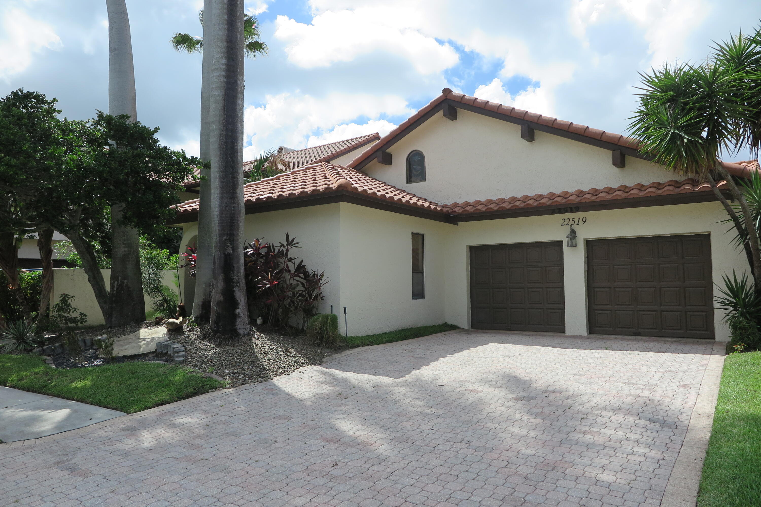 22519 Esplanada Circle Boca Raton, FL 33433 - Photo 1 of 15 a view of a house with a yard and garage