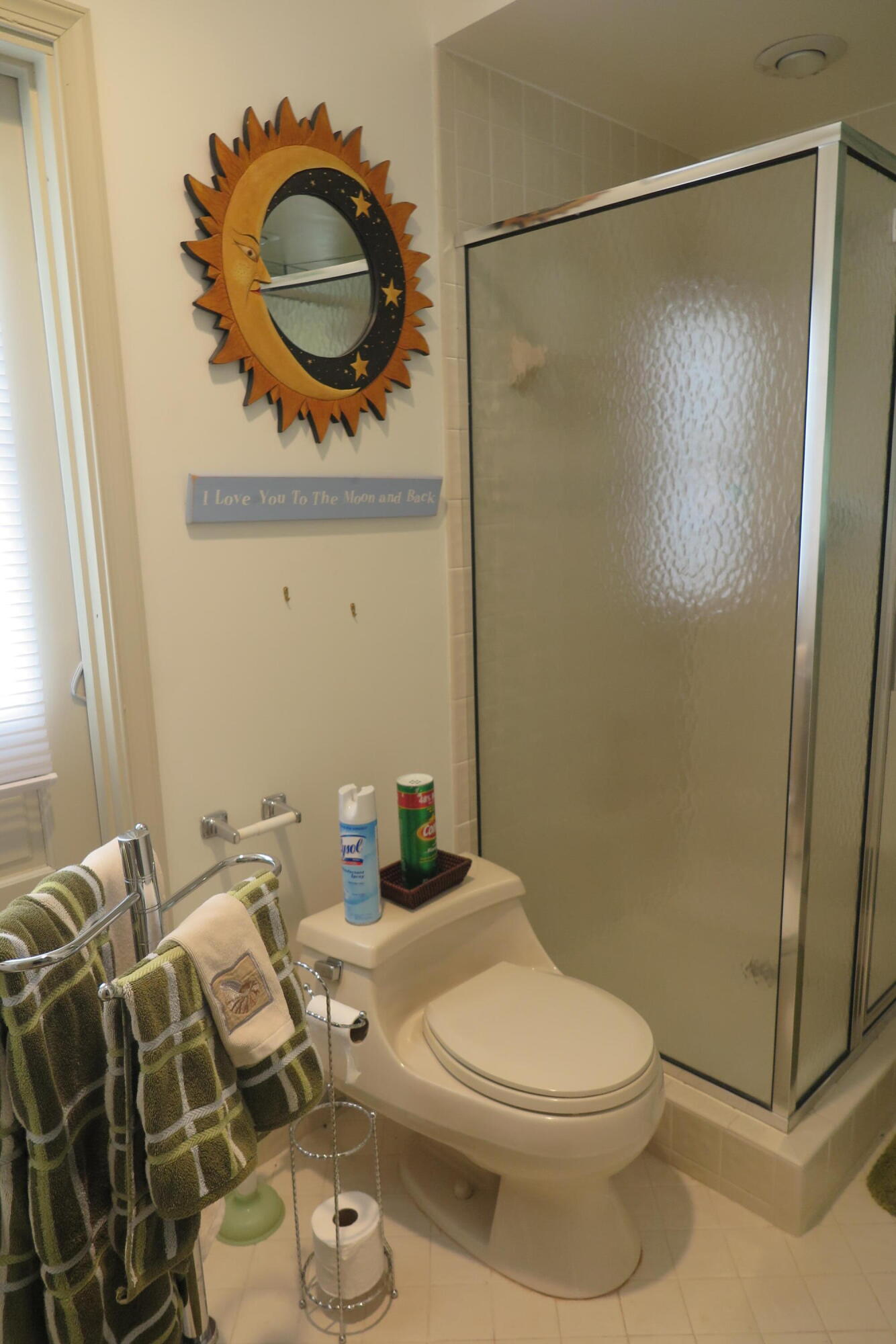 22519 Esplanada Circle Boca Raton, FL 33433 - Photo 12 of 15 a bathroom with a toilet mirror vanity and a shower