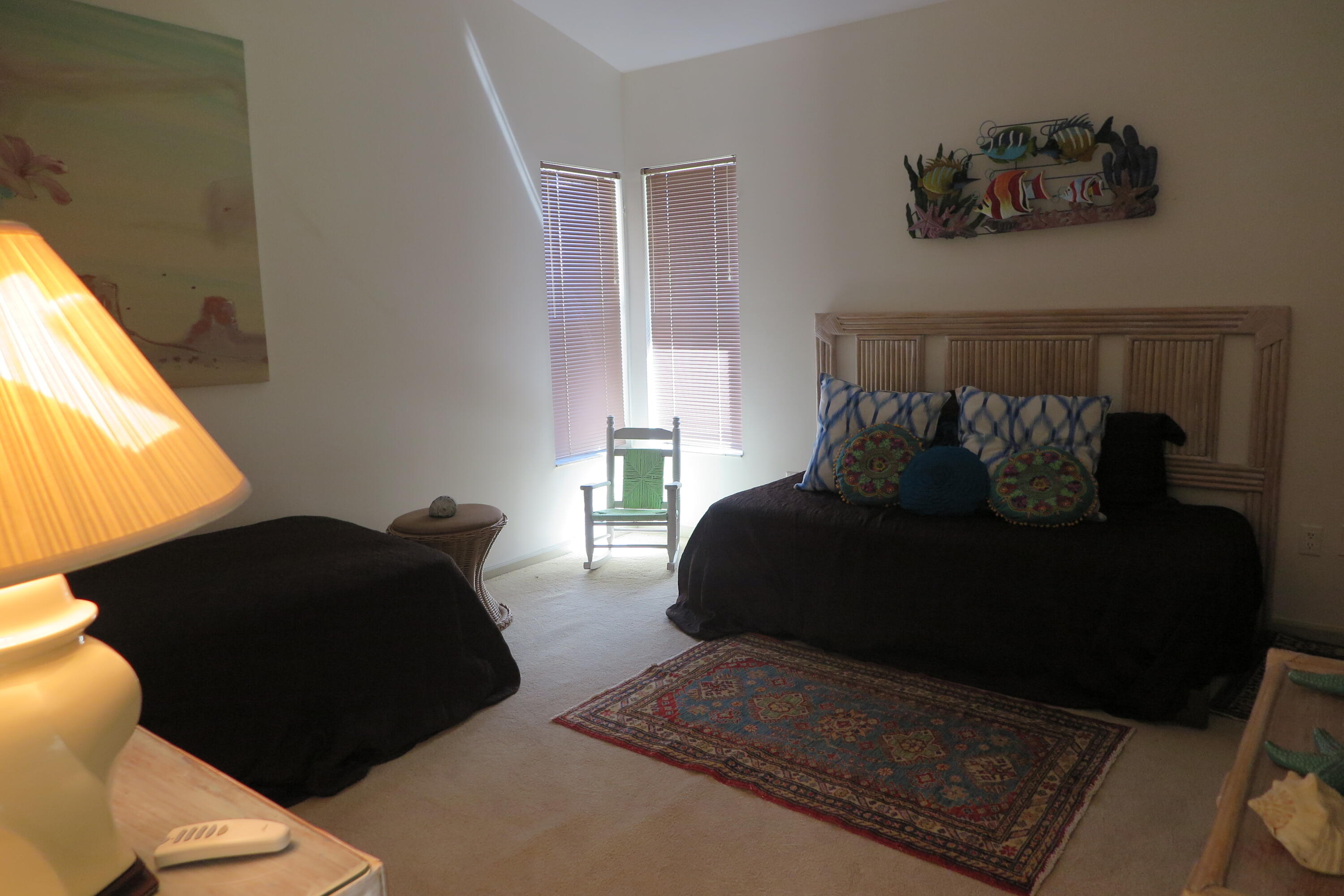 22519 Esplanada Circle Boca Raton, FL 33433 - Photo 13 of 15 a bedroom with a bed and a window