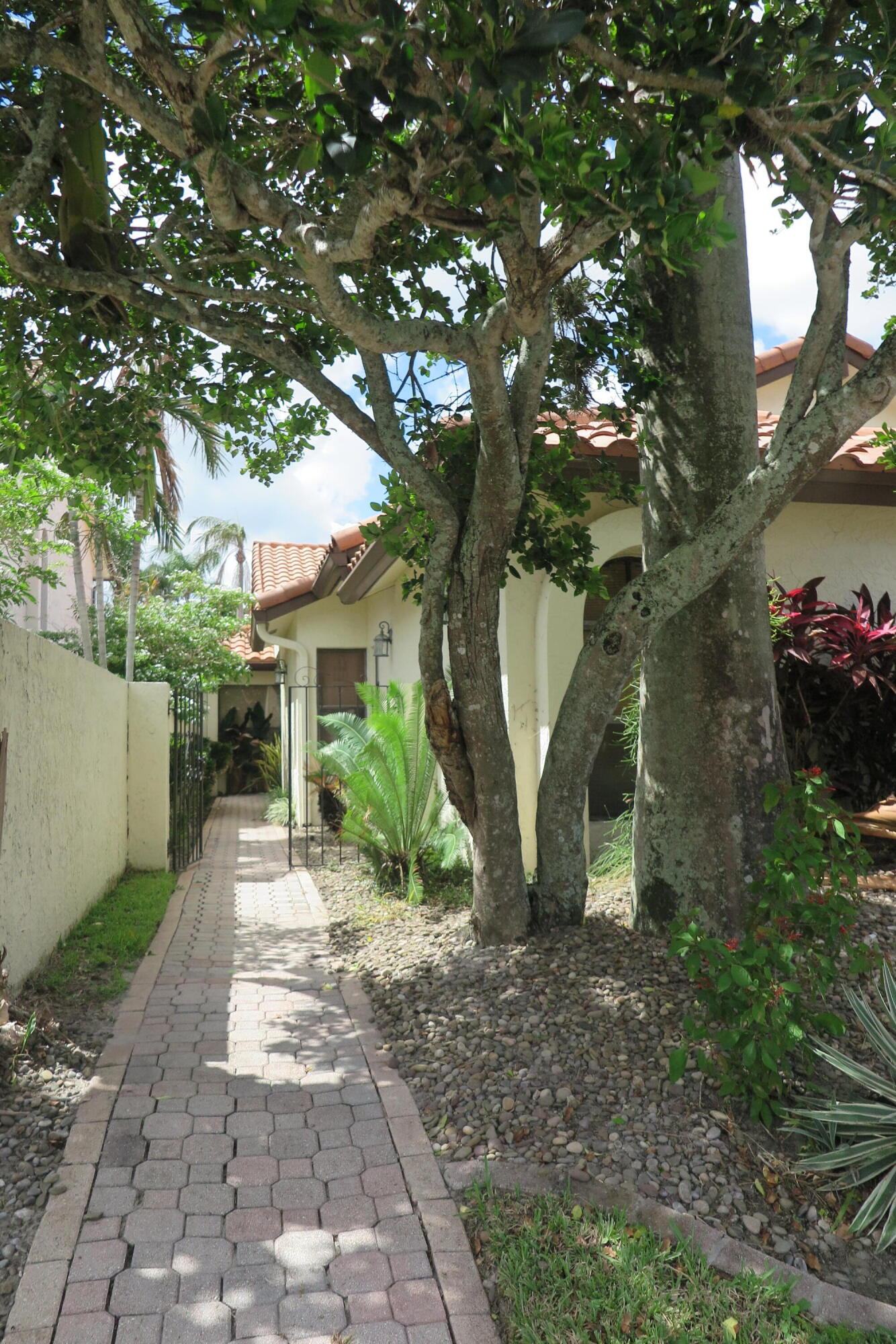 22519 Esplanada Circle Boca Raton, FL 33433 - Photo 2 of 15 a view of a house with a tree in the background