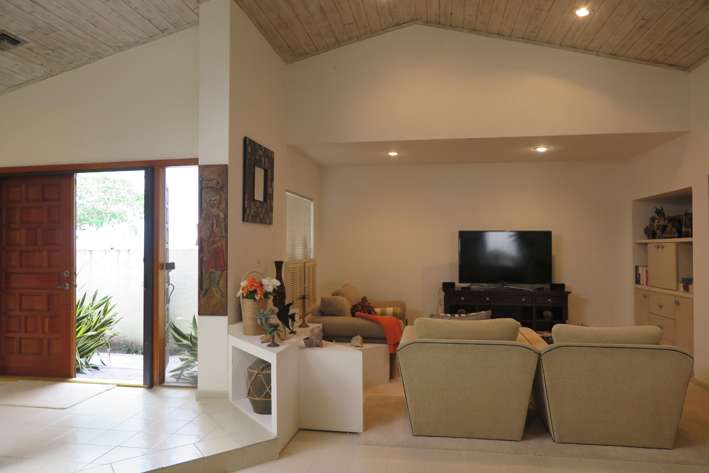 22519 Esplanada Circle Boca Raton, FL 33433 - Photo 7 of 15 a living room with furniture and a flat screen tv