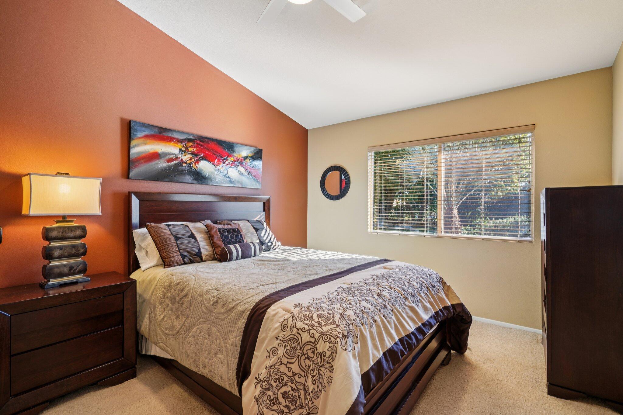 49382 Wayne Street Indio, CA 92201 - Photo 18 of 69 a bedroom with a bed and a window