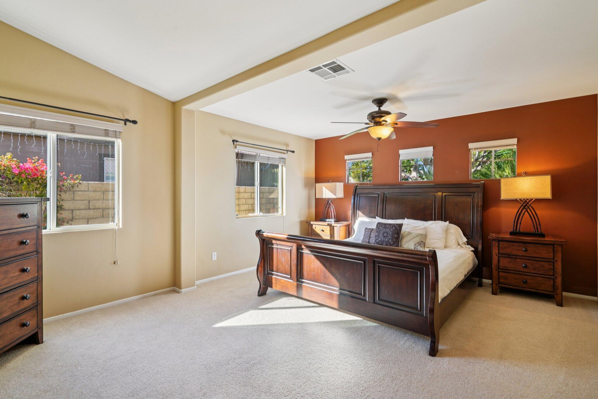 49382 Wayne Street Indio, CA 92201 - Photo 23 of 69 a bed room with a bed and a lamp