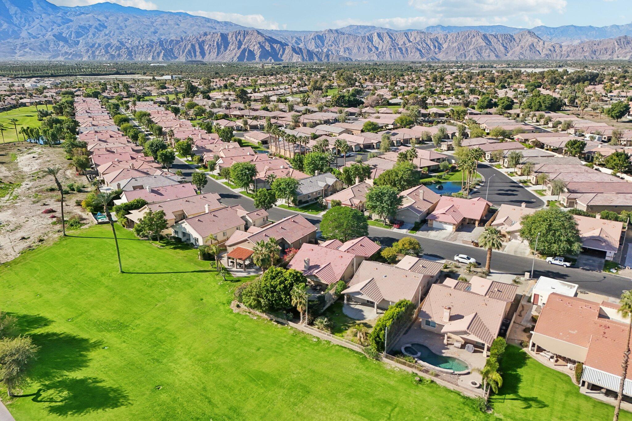 49382 Wayne Street Indio, CA 92201 - Photo 42 of 69 an aerial view of a house with a garden