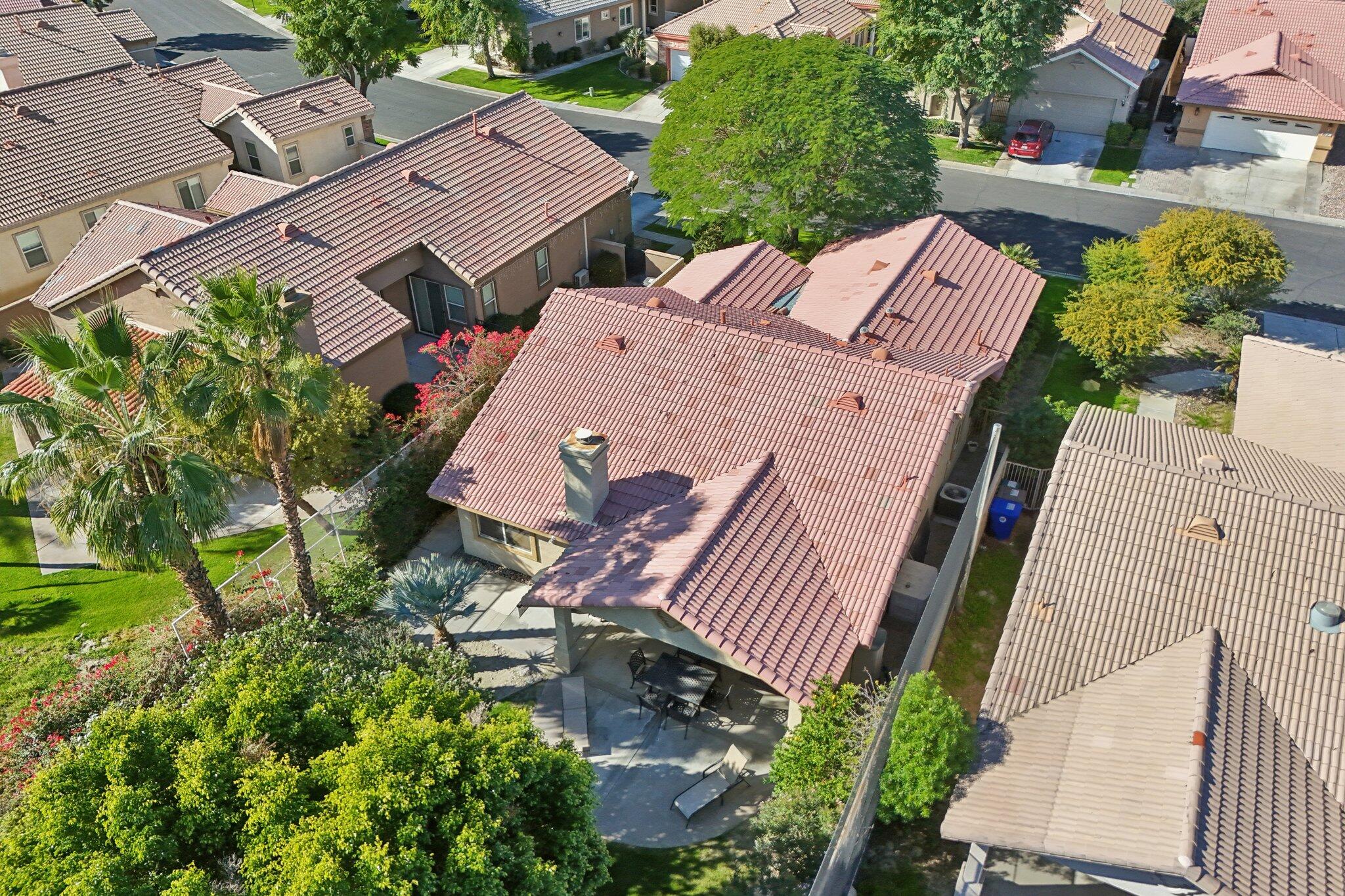 49382 Wayne Street Indio, CA 92201 - Photo 45 of 69 an aerial view of a house with a garden
