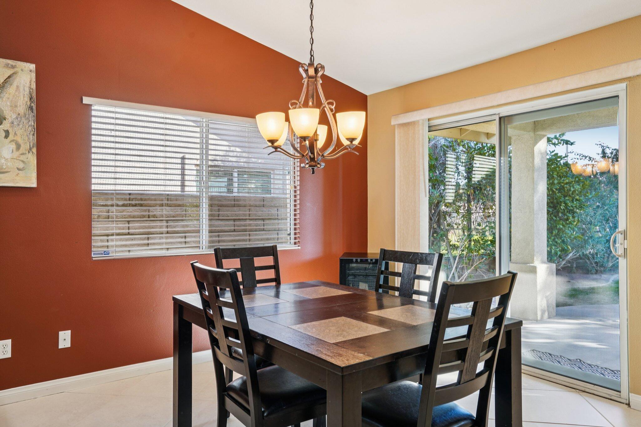 49382 Wayne Street Indio, CA 92201 - Photo 10 of 69 a view of a dining room with furniture window and outside view