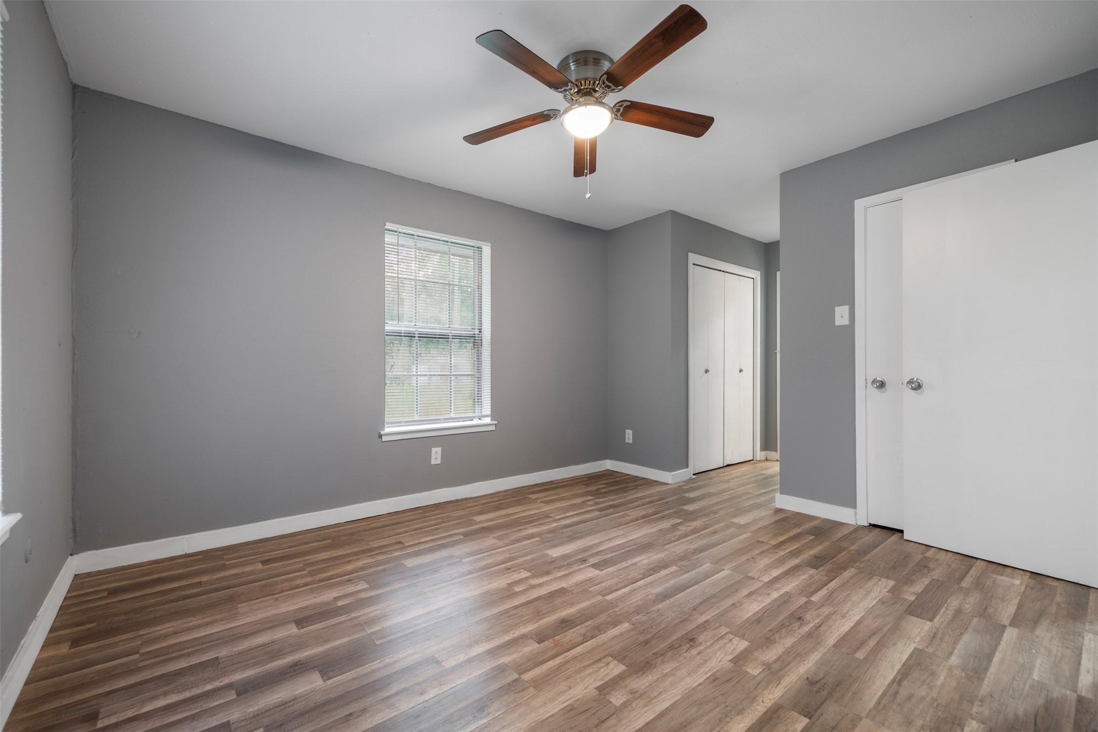1204 Crescent Boulevard Cleveland, TX 77327 - Photo 12 of 24 a view of an empty room with a window