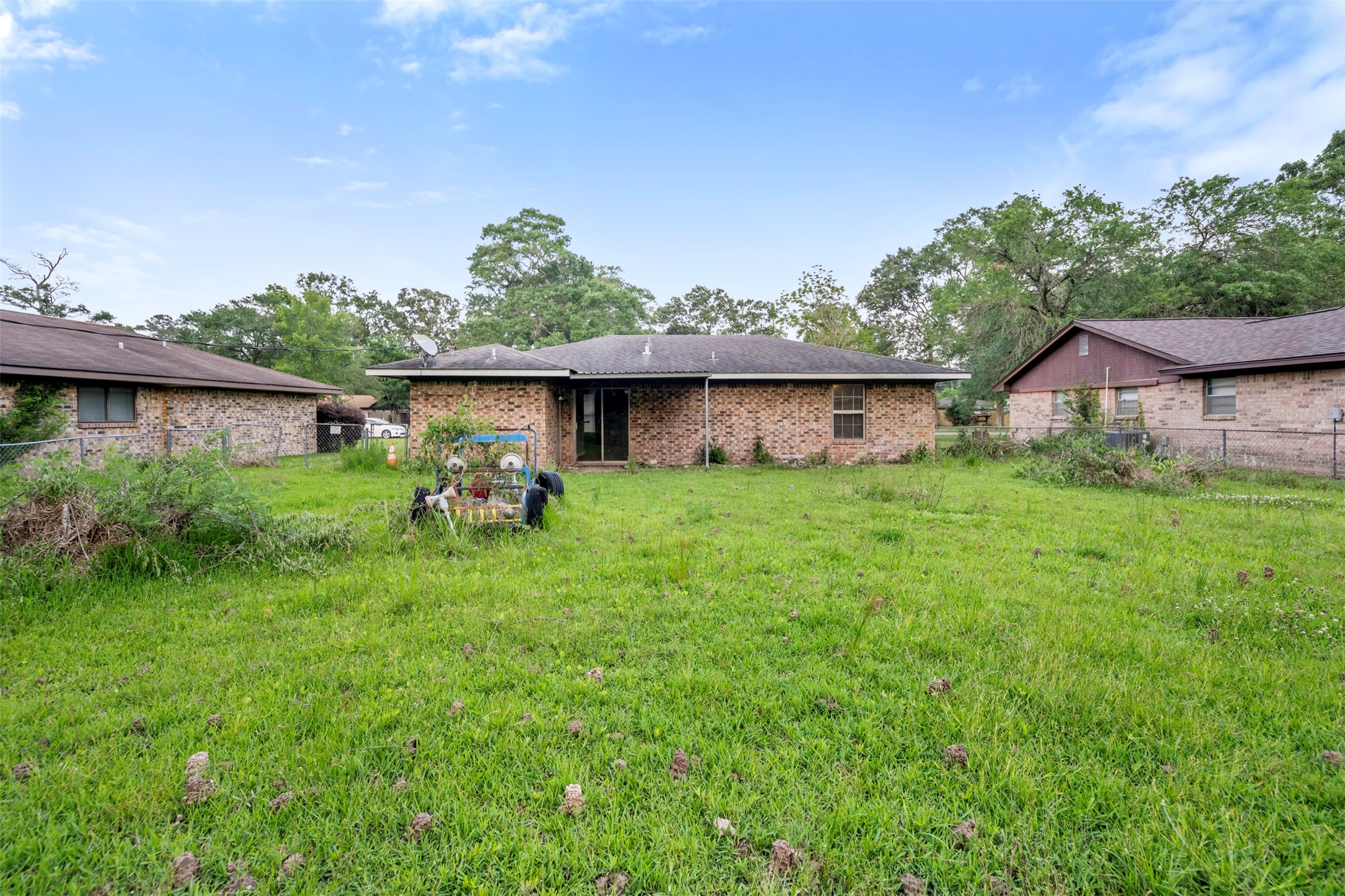 1204 Crescent Boulevard Cleveland, TX 77327 - Photo 20 of 24 a front view of a house with garden