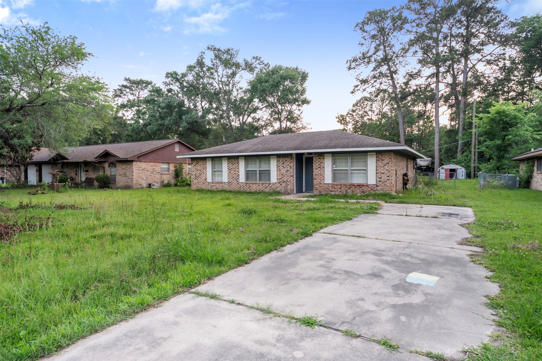 1204 Crescent Boulevard Cleveland, TX 77327 - Photo 2 of 24 a view of house with a yard