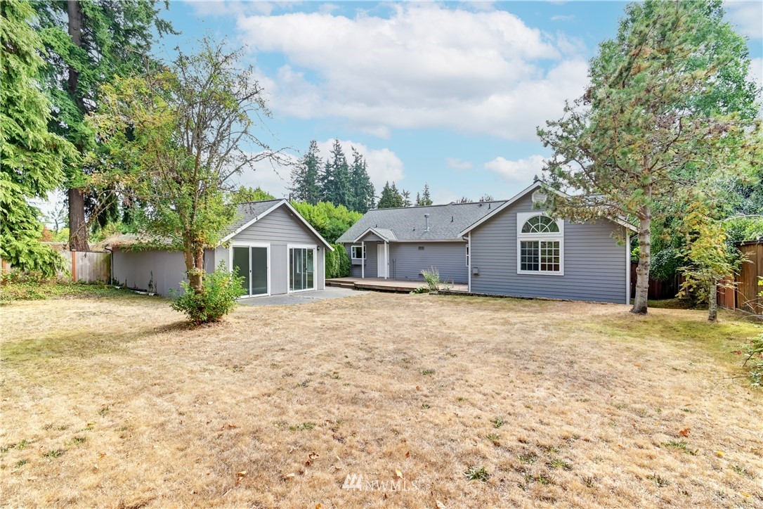 425 South Cabot Road Everett, WA 98203 - Photo 21 of 24 a house with wooden fence