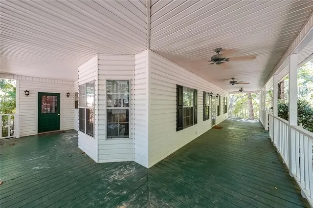 a view of a porch and garden