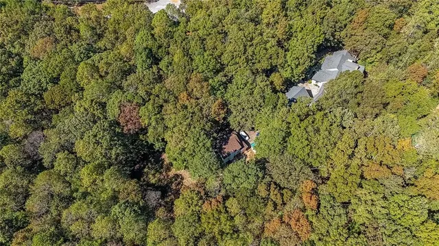 a view of a house with a tree