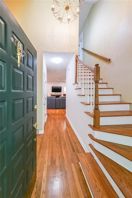 6554 Fox Run Winston, GA 30187 - Photo 4 of 40 a view of entryway and hall with wooden floor
