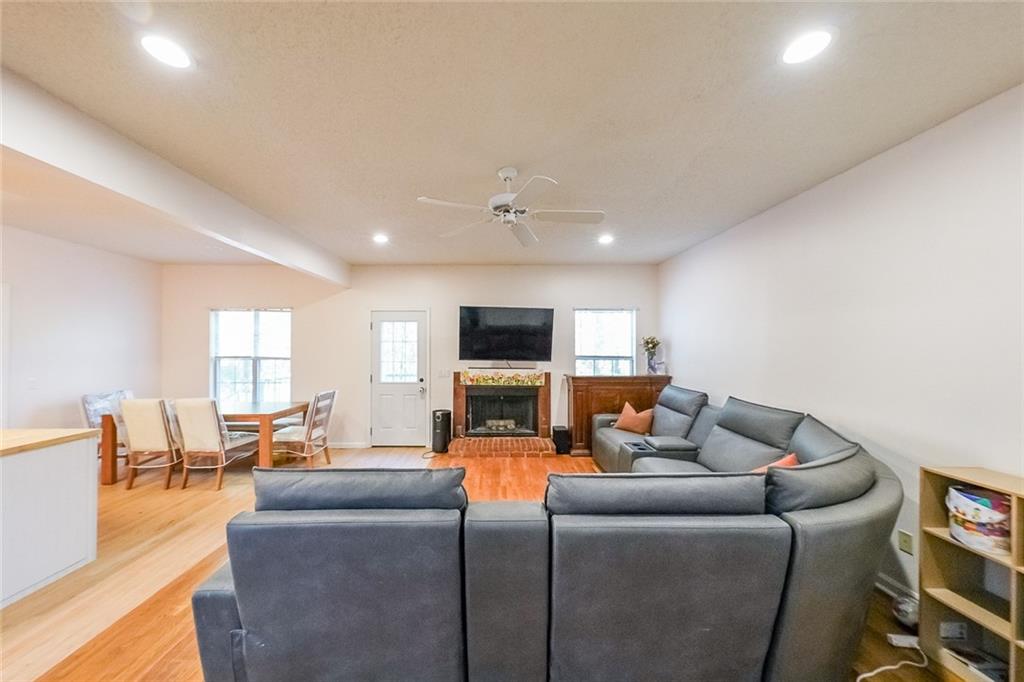 6554 Fox Run Winston, GA 30187 - Photo 5 of 40 a living room with furniture and a flat screen tv