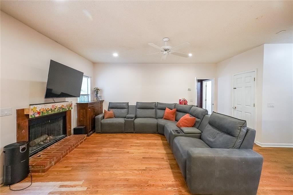 6554 Fox Run Winston, GA 30187 - Photo 9 of 40 a living room with furniture and a flat screen tv