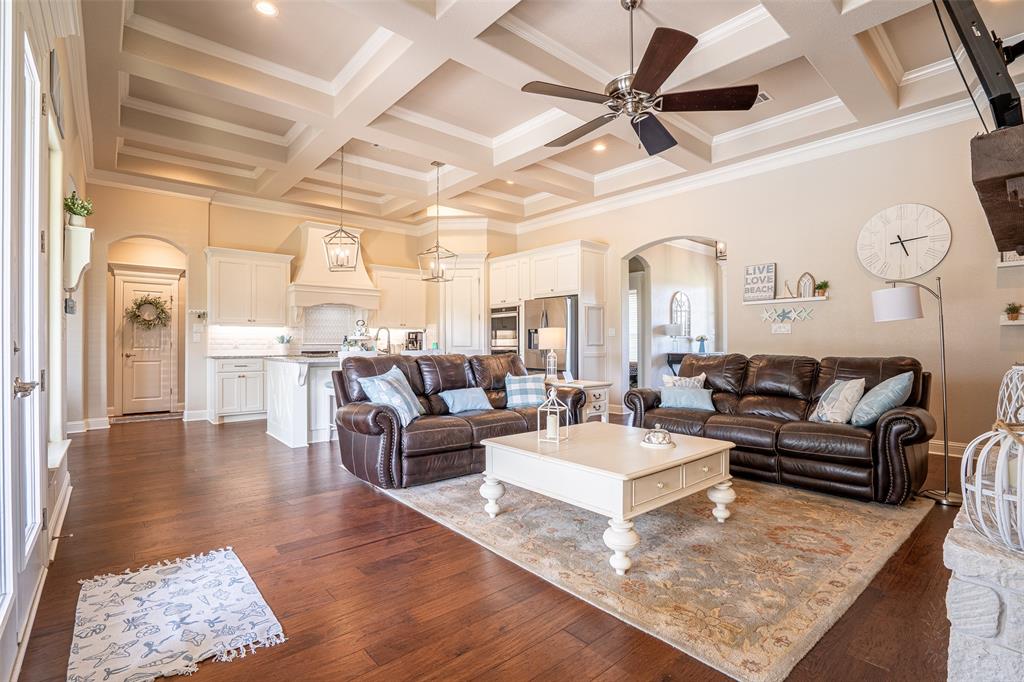 1920 Meander Road Granbury, TX 76049 - Photo 7 of 40 Open-concept living space featuring wood-finish flooring, a coffered ceiling, and recessed lighting