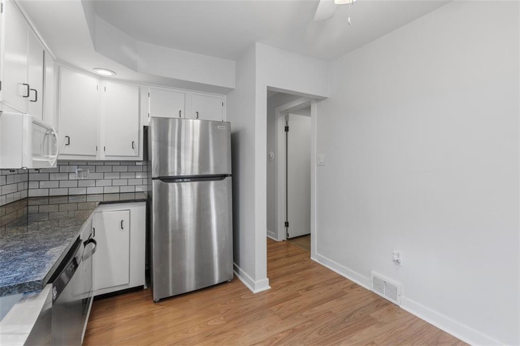 2219 Hill Road South Heights, PA 15081 - Photo 11 of 34 a kitchen with stainless steel appliances granite countertop a refrigerator and a sink