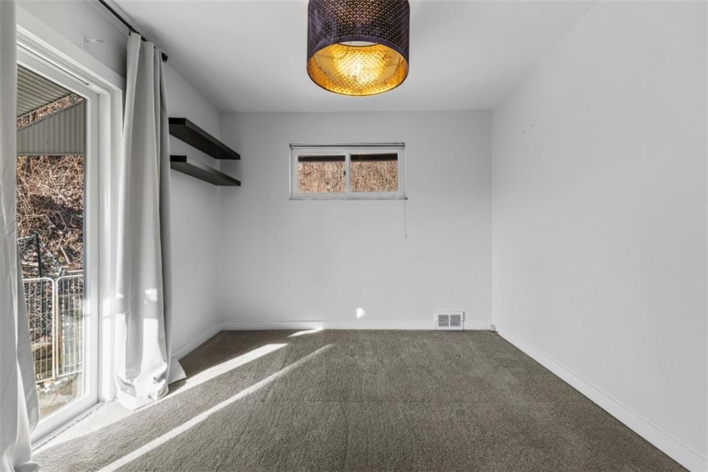 2219 Hill Road South Heights, PA 15081 - Photo 18 of 34 a view of a room with wooden floor and window