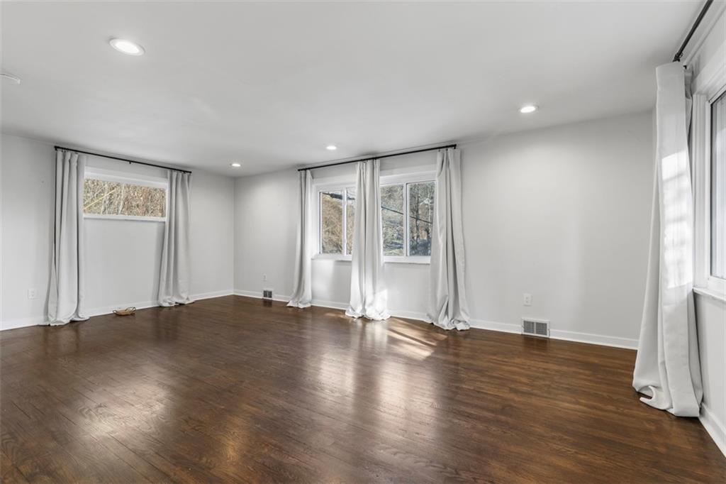 2219 Hill Road South Heights, PA 15081 - Photo 9 of 34 an empty room with wooden floor and windows