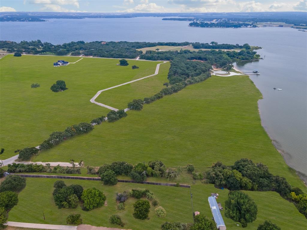 1533 Park Street Azle, TX 76020 - Photo 11 of 18 an aerial view of ocean with residential house with outdoor space