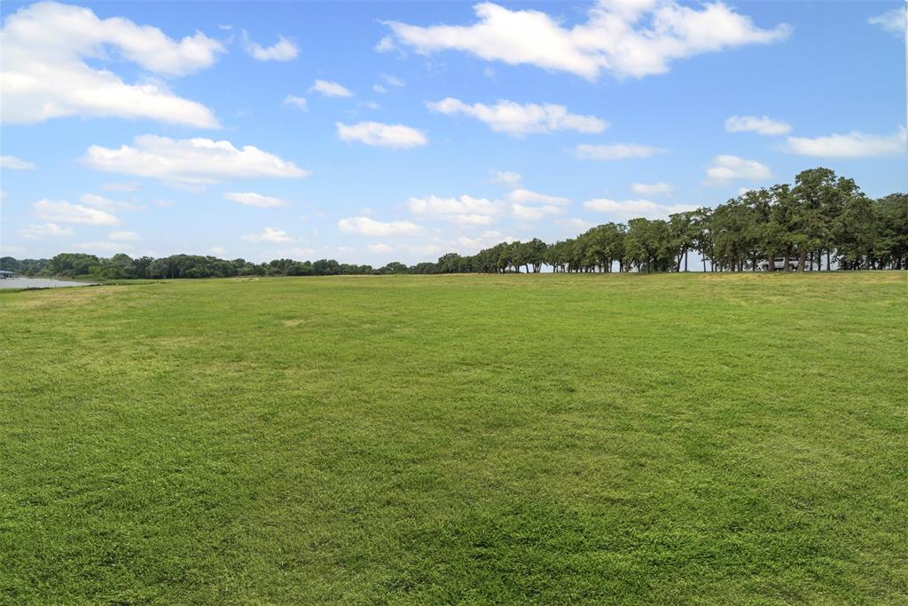 1533 Park Street Azle, TX 76020 - Photo 15 of 18 a view of an ocean and beach