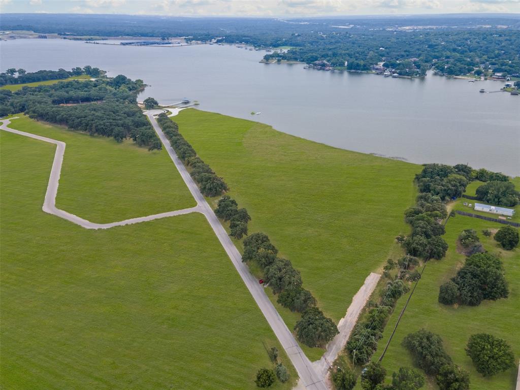 1533 Park Street Azle, TX 76020 - Photo 9 of 18 a view of a lake with a yard