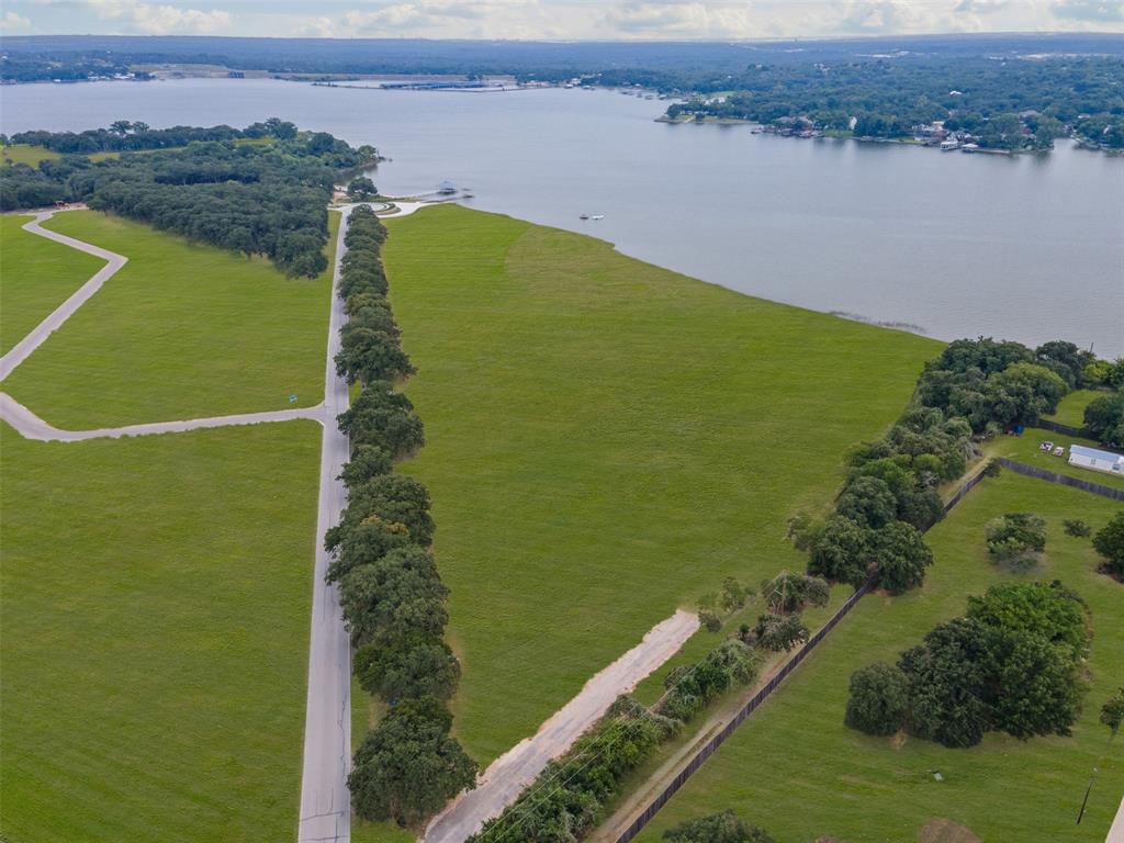 1533 Park Street Azle, TX 76020 - Photo 10 of 18 a view of a lake with a yard