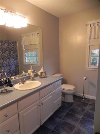 85 Culloden Drive Canton, MA 02021 - Photo 16 of 23 a bathroom with a toilet sink and mirror